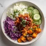 BBQ Chicken Bowls with Sweet Potatoes, Coleslaw, and Pickles Recipe